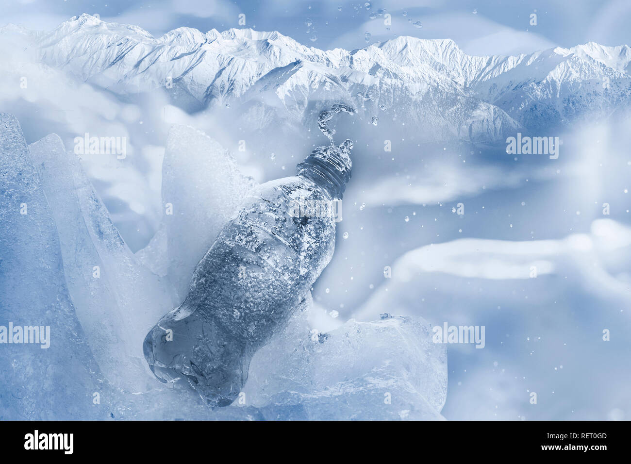 water in cup. ice and mountains Stock Photo