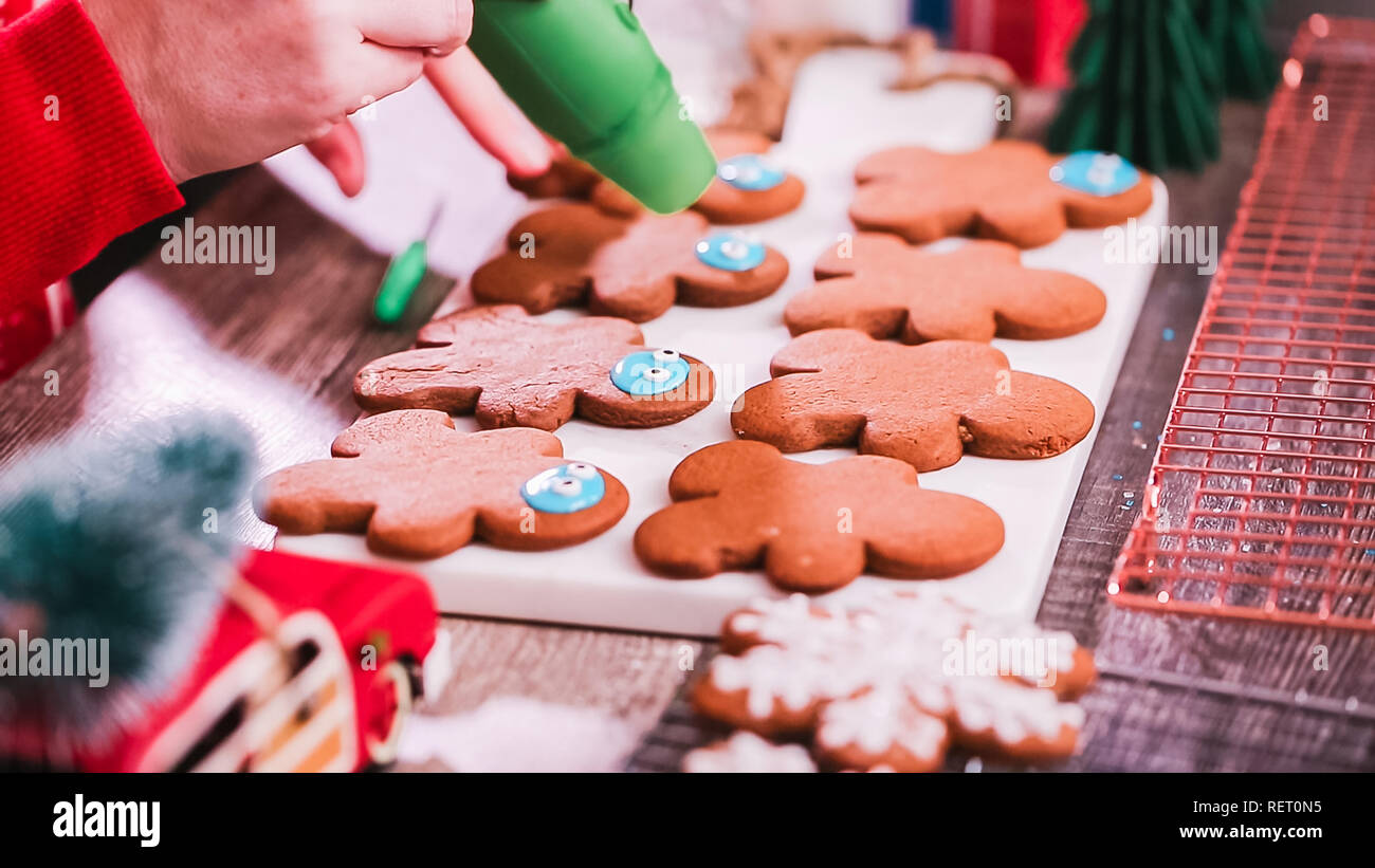Step by step. Decorating gingerbread cookies with royal icing Stock