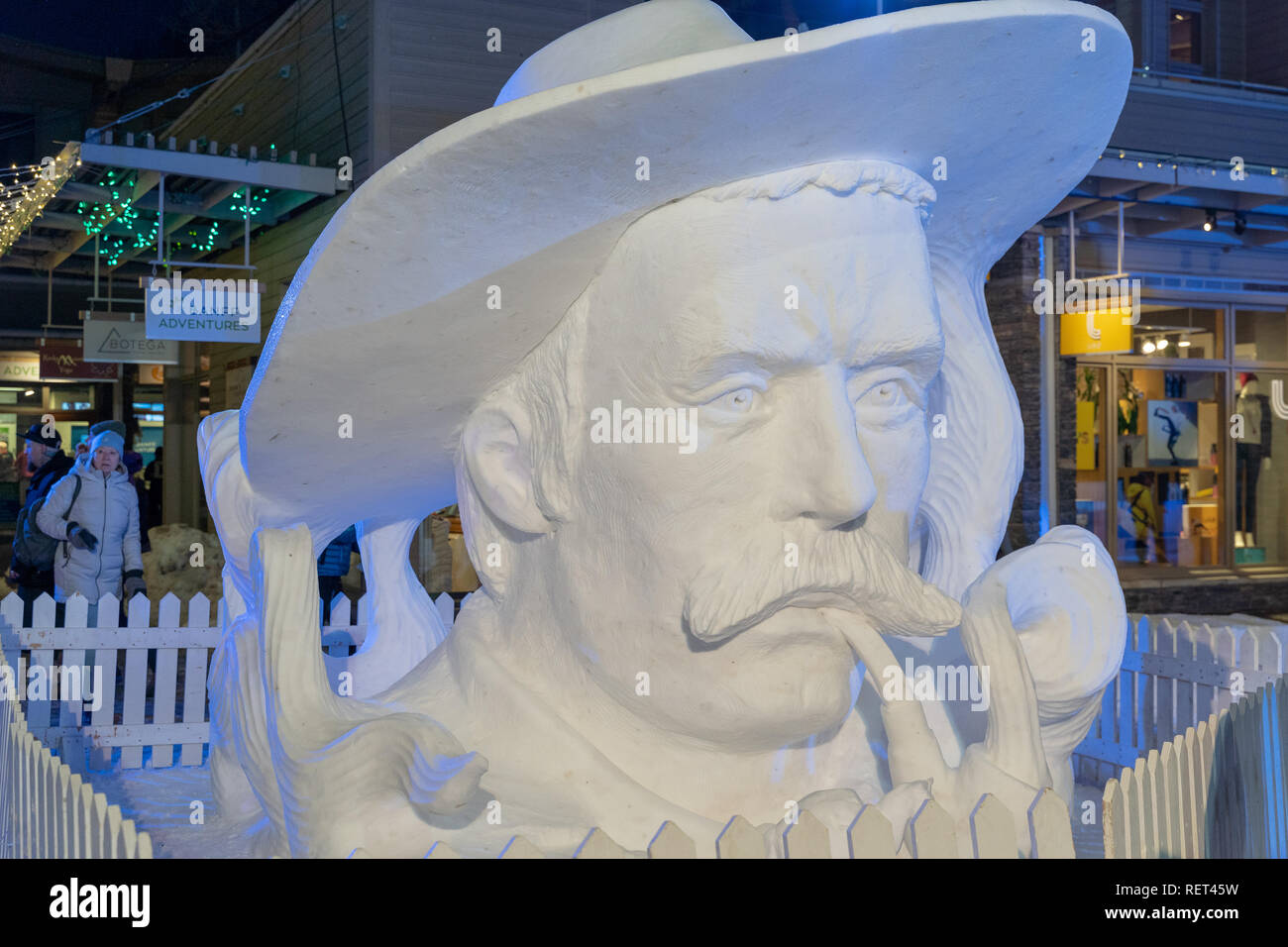Banff, Alberta Canada - Jan 19, 2019: Snow sculpture of WIld Bill Peyto in Banff Avenue Square during Banff Lake Louise Snow Days 2019 in winter Stock Photo