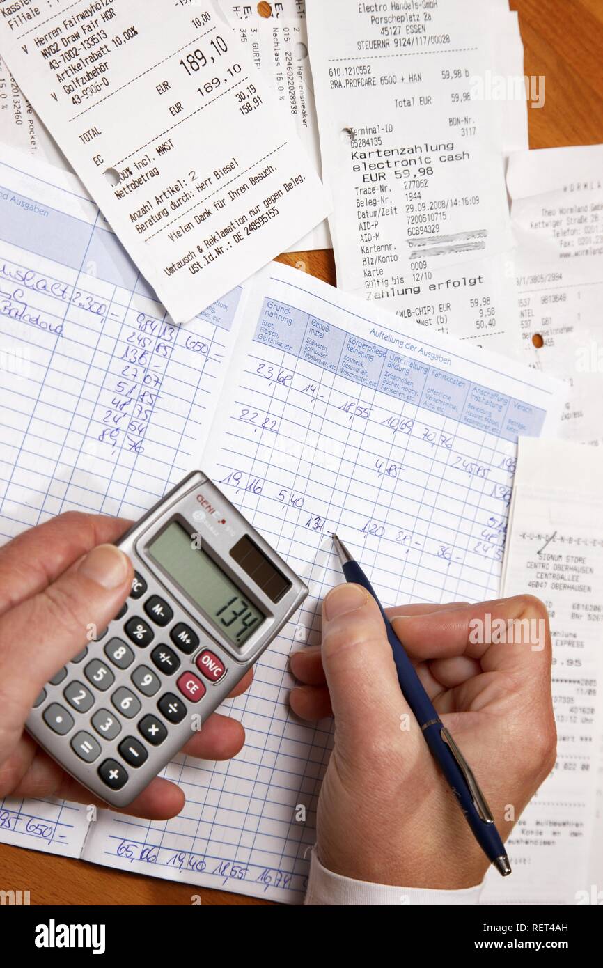 Private housekeeping book, calculator to control the expences Stock Photo