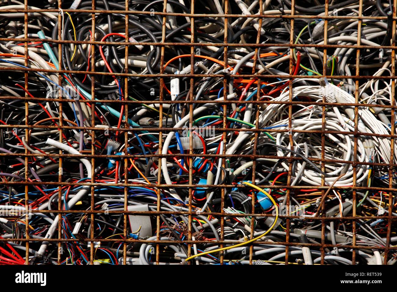 Electronic scrap, sorted used computer parts, at a recycling yard