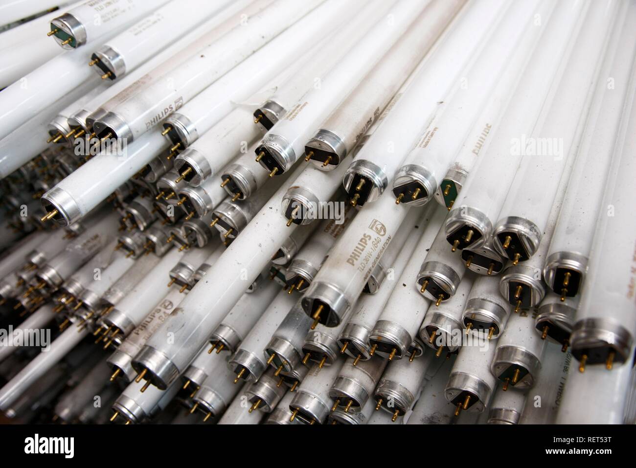 Damaged and discarded fluorescent lamp tubes for disposal at a