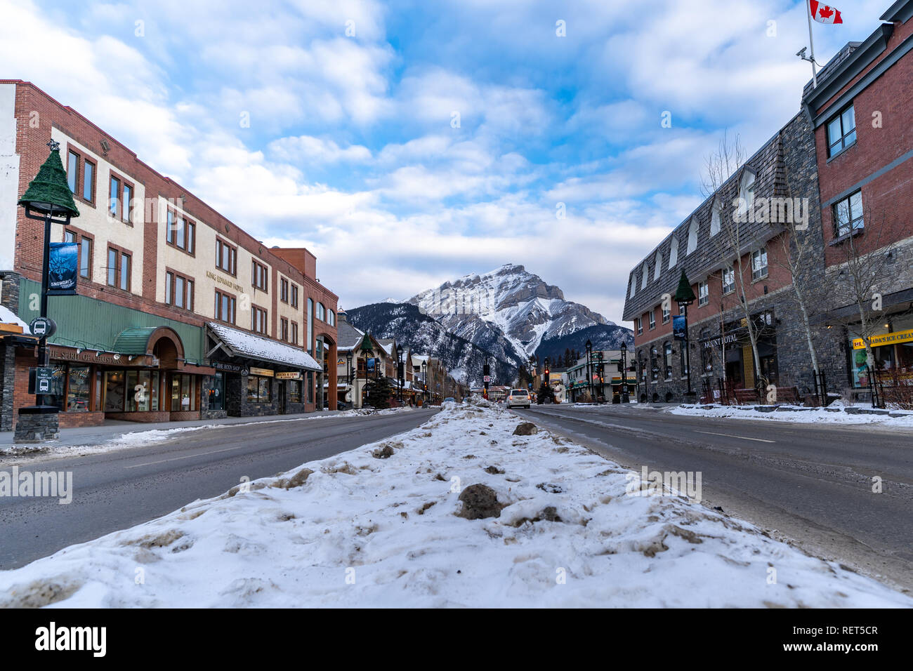 Banff, Alberta Canada - Jan 21, 2019: View of Banff Avenue, a popular tourist destination in the Canadian Rockies, filled with gift shops and restaura Stock Photo
