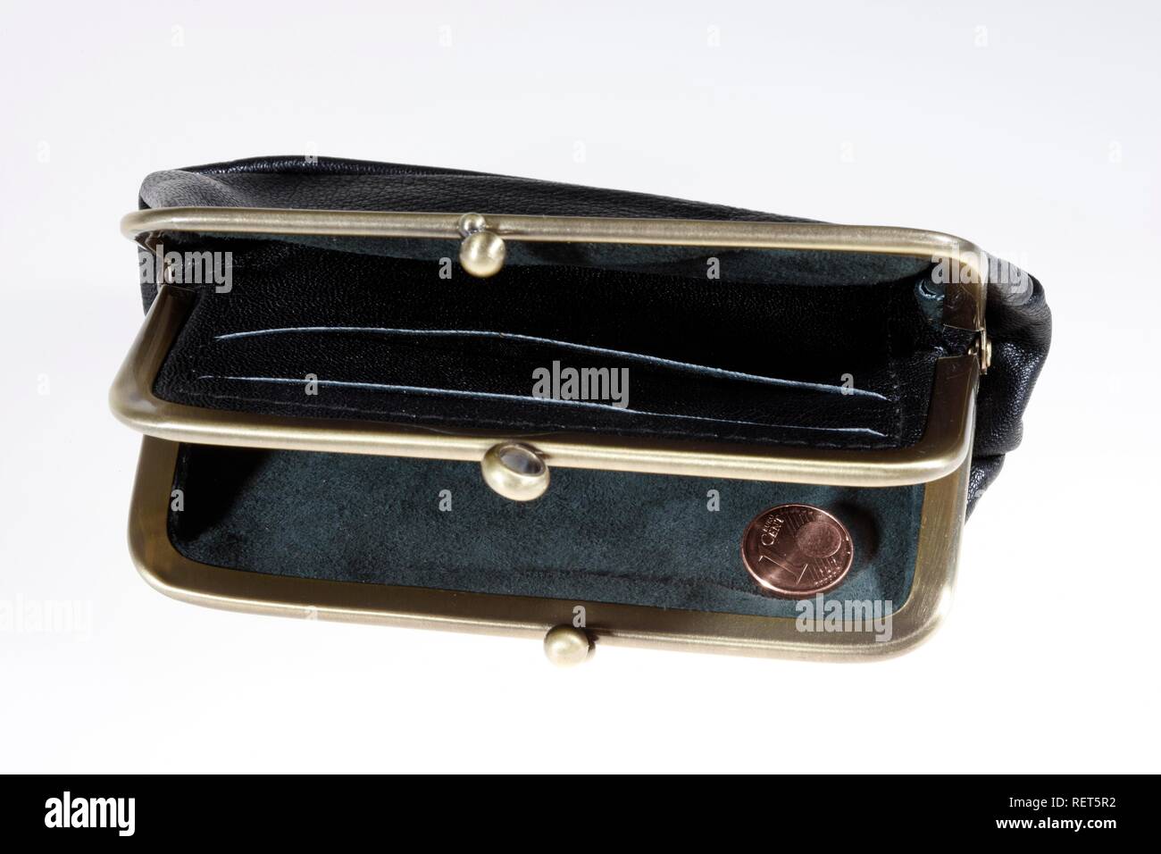 Coins in a purse Stock Photo Alamy