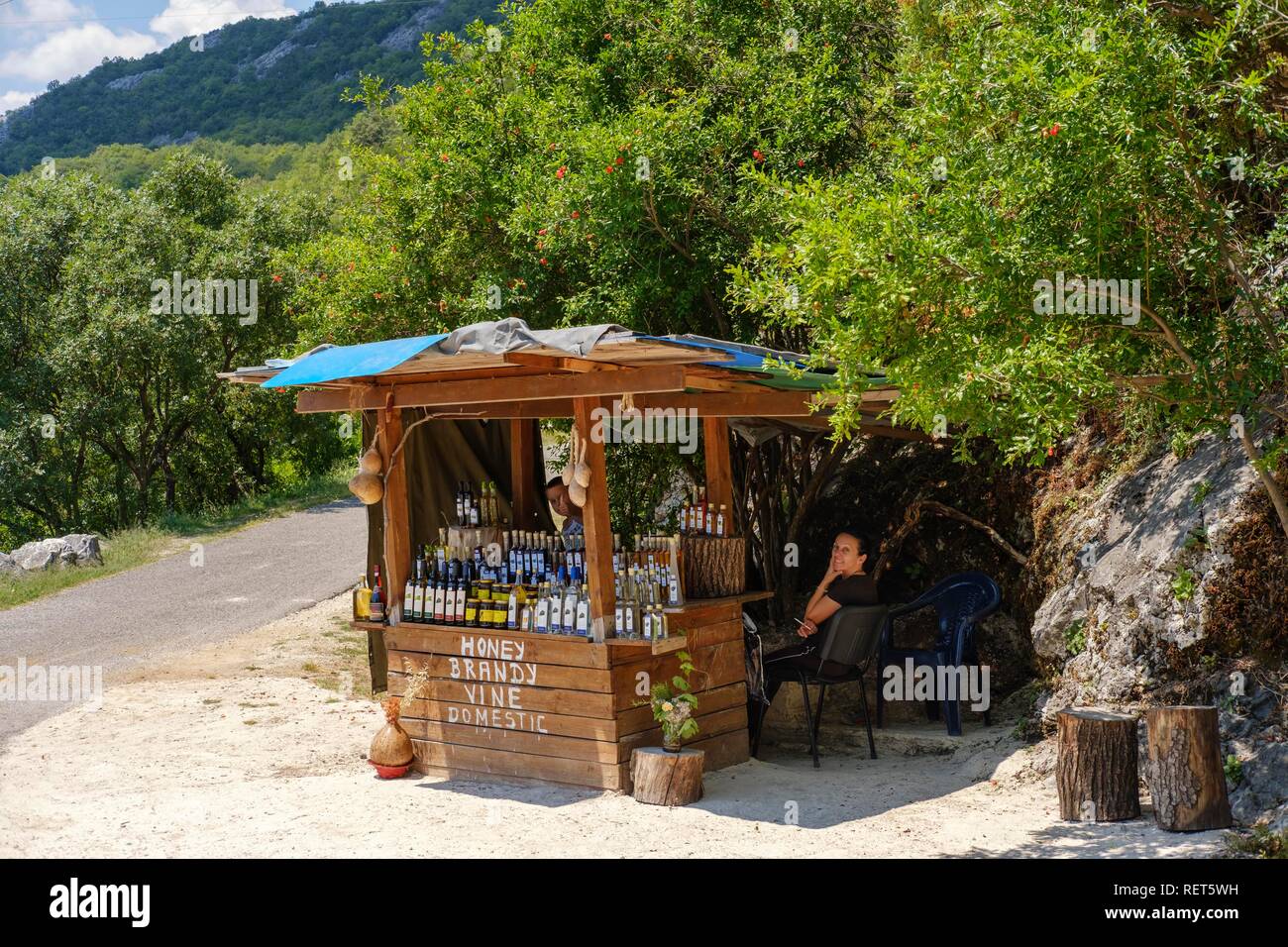 Street sale of local specialties, near Virpazar, Lake Skadar National Park, near Bar, Montenegro Stock Photo