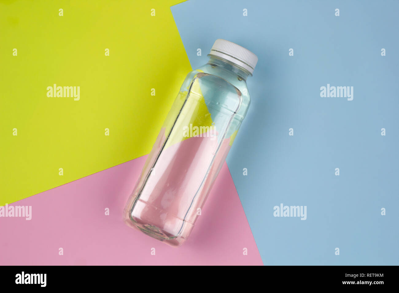 top view flat lay water bottle on a vibrant background Stock Photo