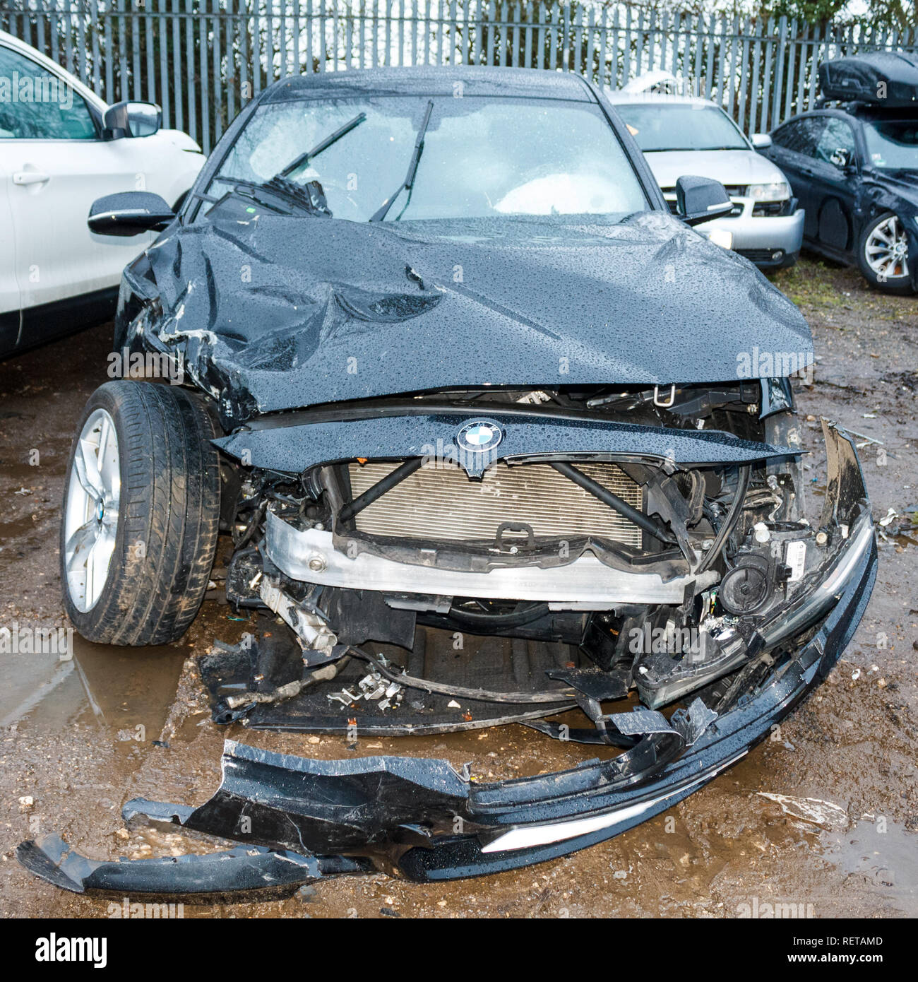 Car crash / vehicle damage; BMW head/side on crash damage. Stock Photo