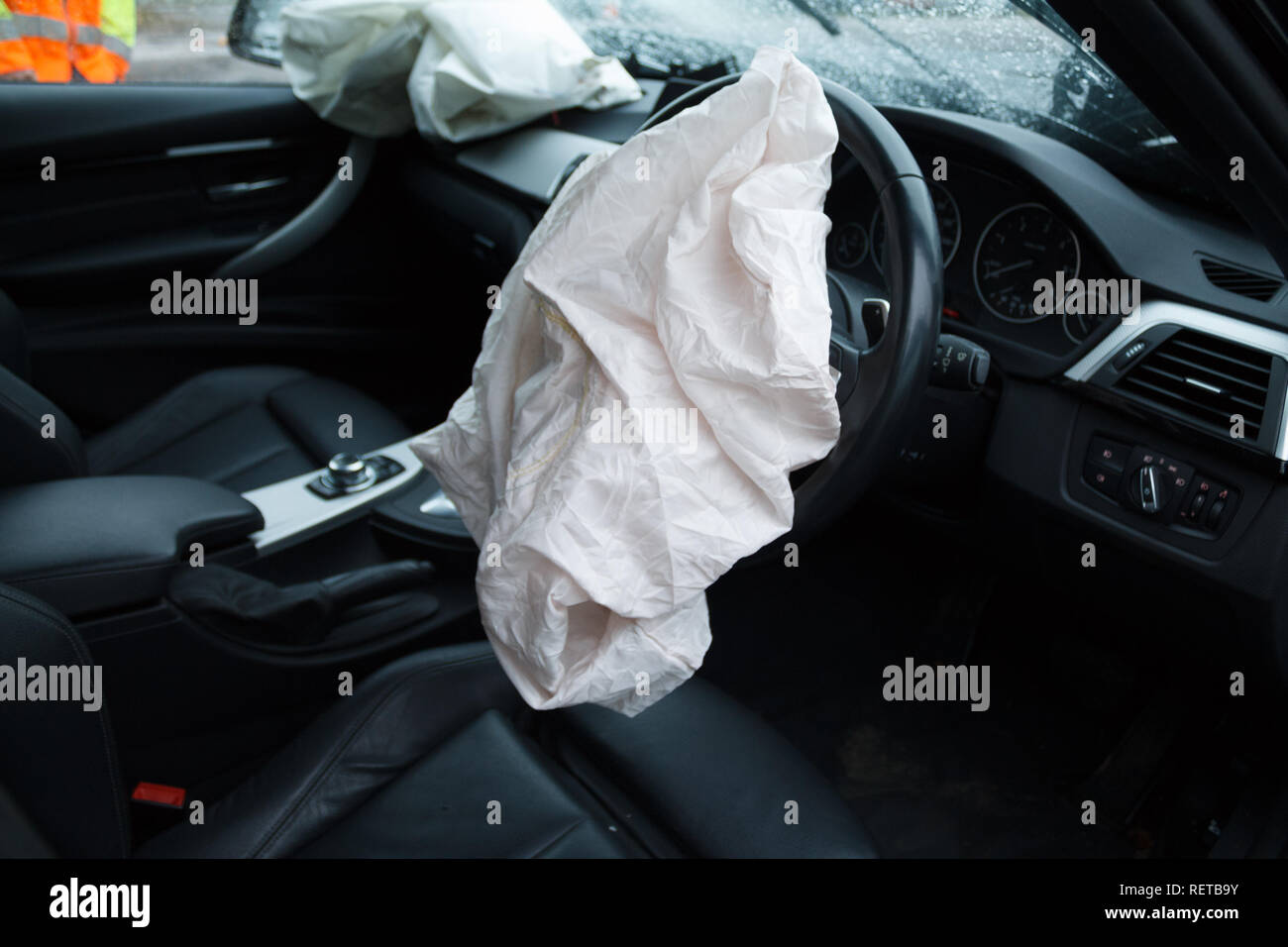 Car crash / vehicle damage; Deployed airbags and smashed windscreen