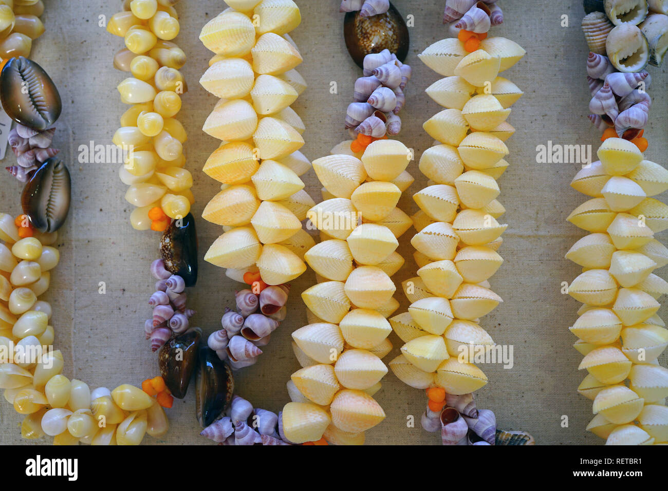 Traditional craft jewelry made with colorful shells from the Tuamoto and Gambier islands in French Polynesia Stock Photo