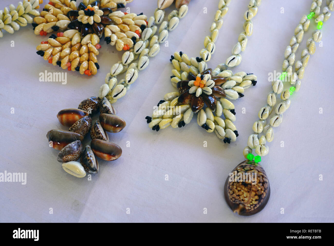 Traditional craft jewelry made with colorful shells from the Tuamoto and Gambier islands in French Polynesia Stock Photo