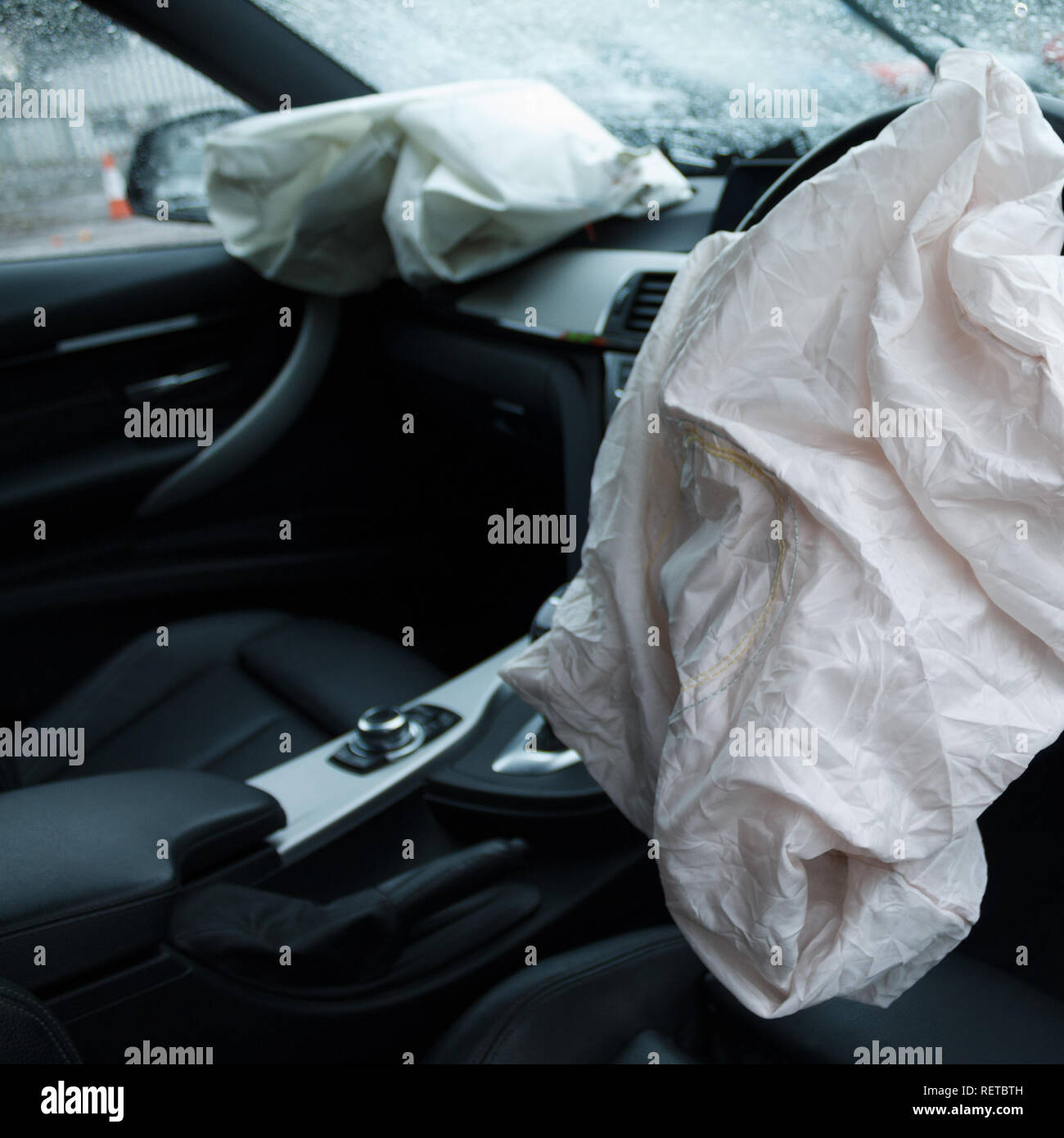 Car crash / vehicle damage; Deployed airbags and smashed windscreen