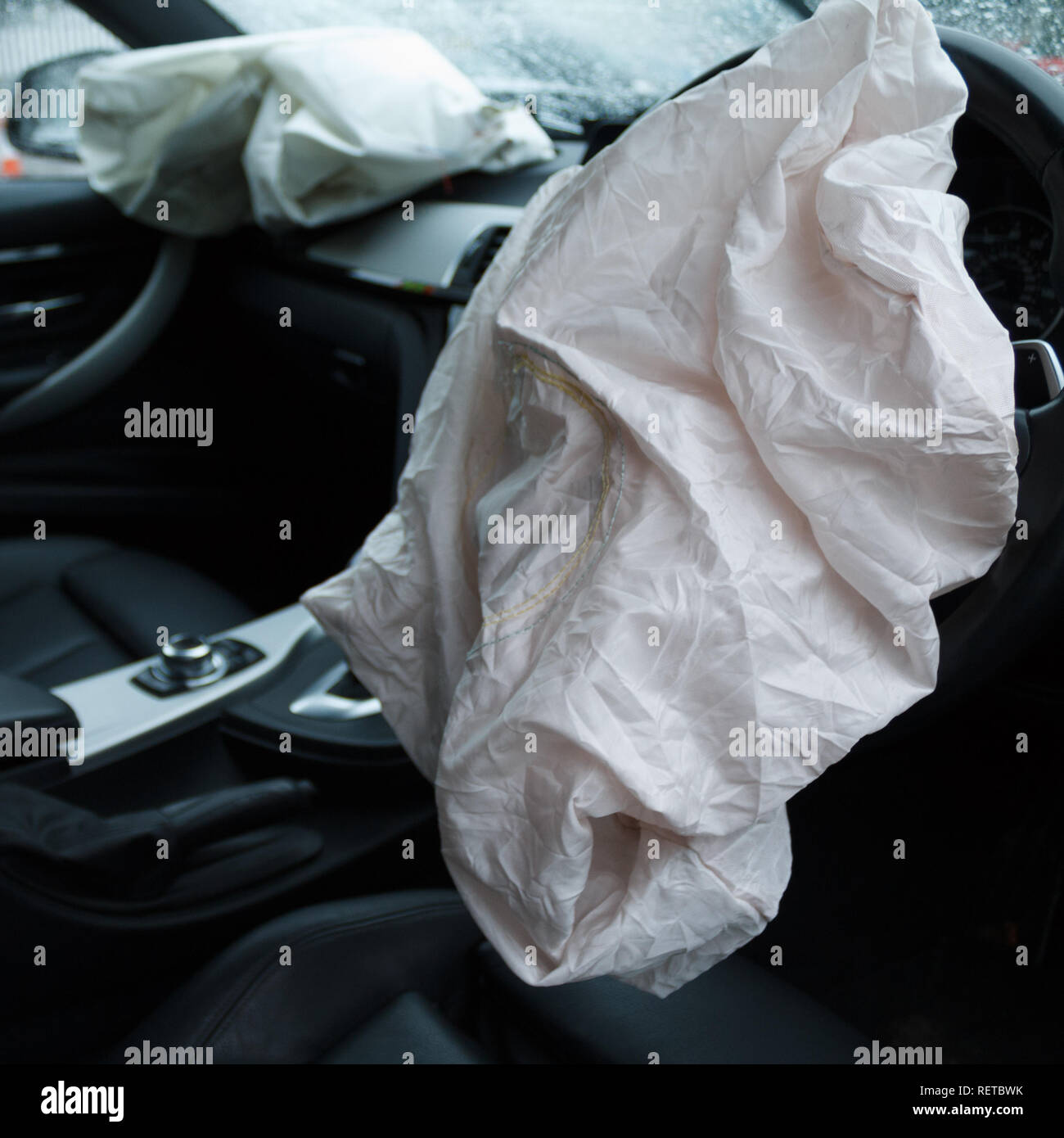 Car crash / vehicle damage; Deployed airbags and smashed windscreen