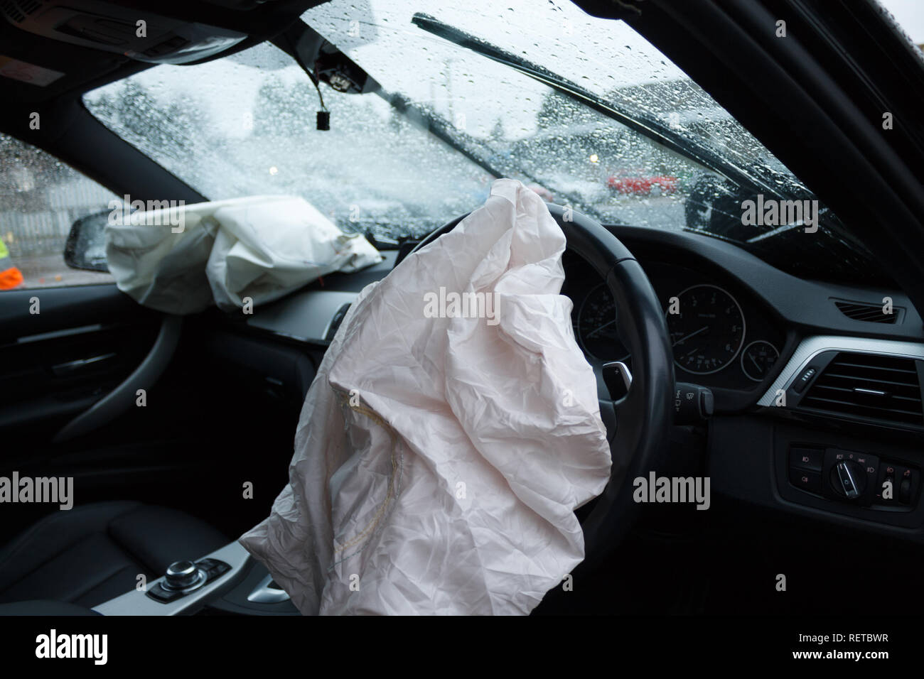 Car crash / vehicle damage; Deployed airbags and smashed windscreen