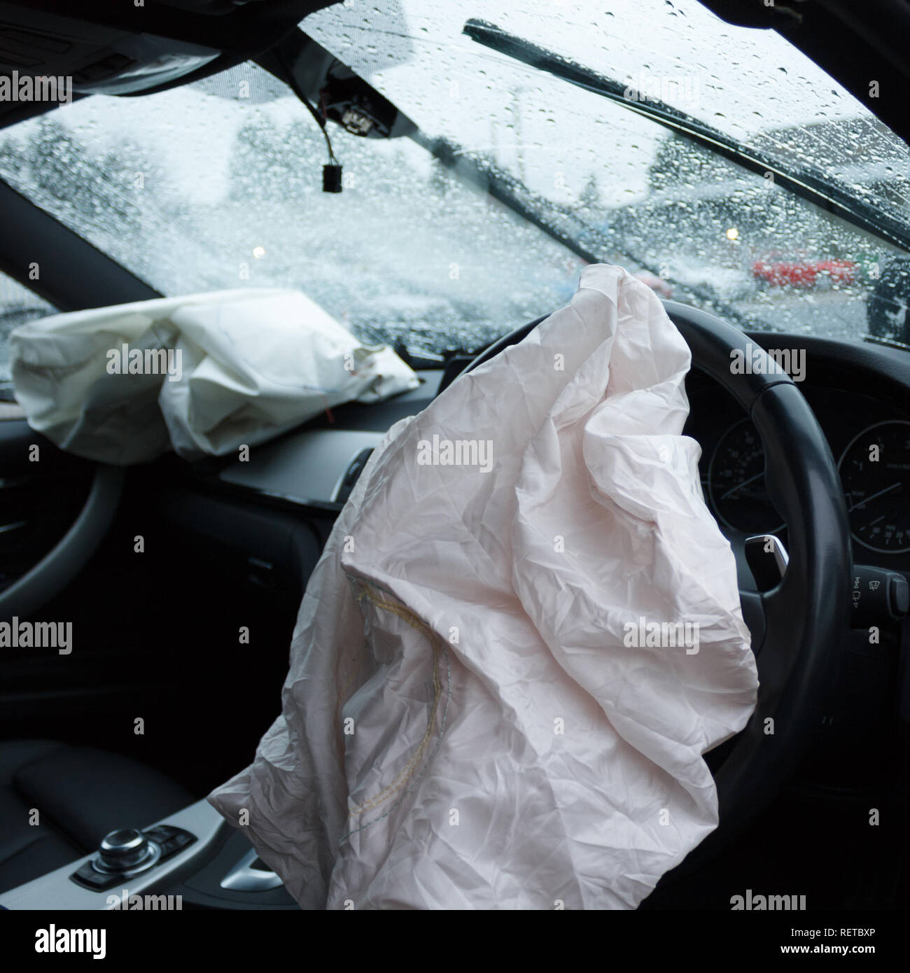 Car crash / vehicle damage; Deployed airbags and smashed windscreen