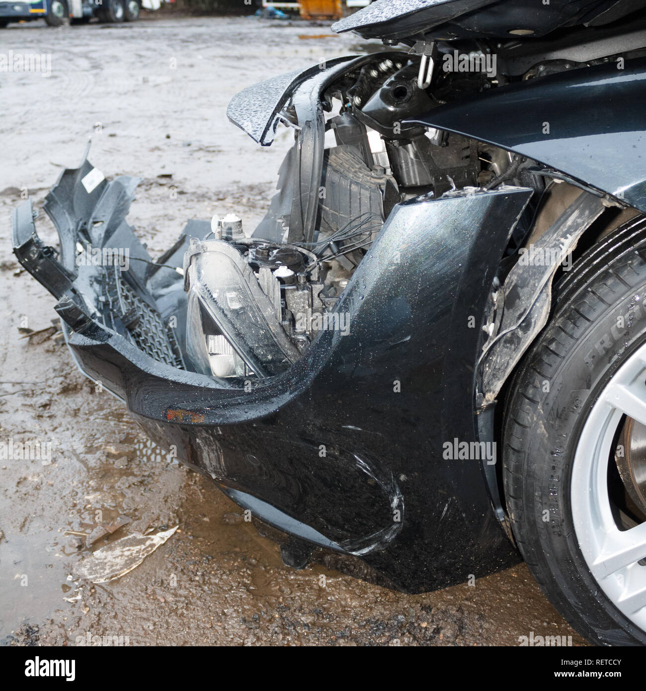 Car crash / vehicle damage; Head on crash, front bumper damage. Stock Photo