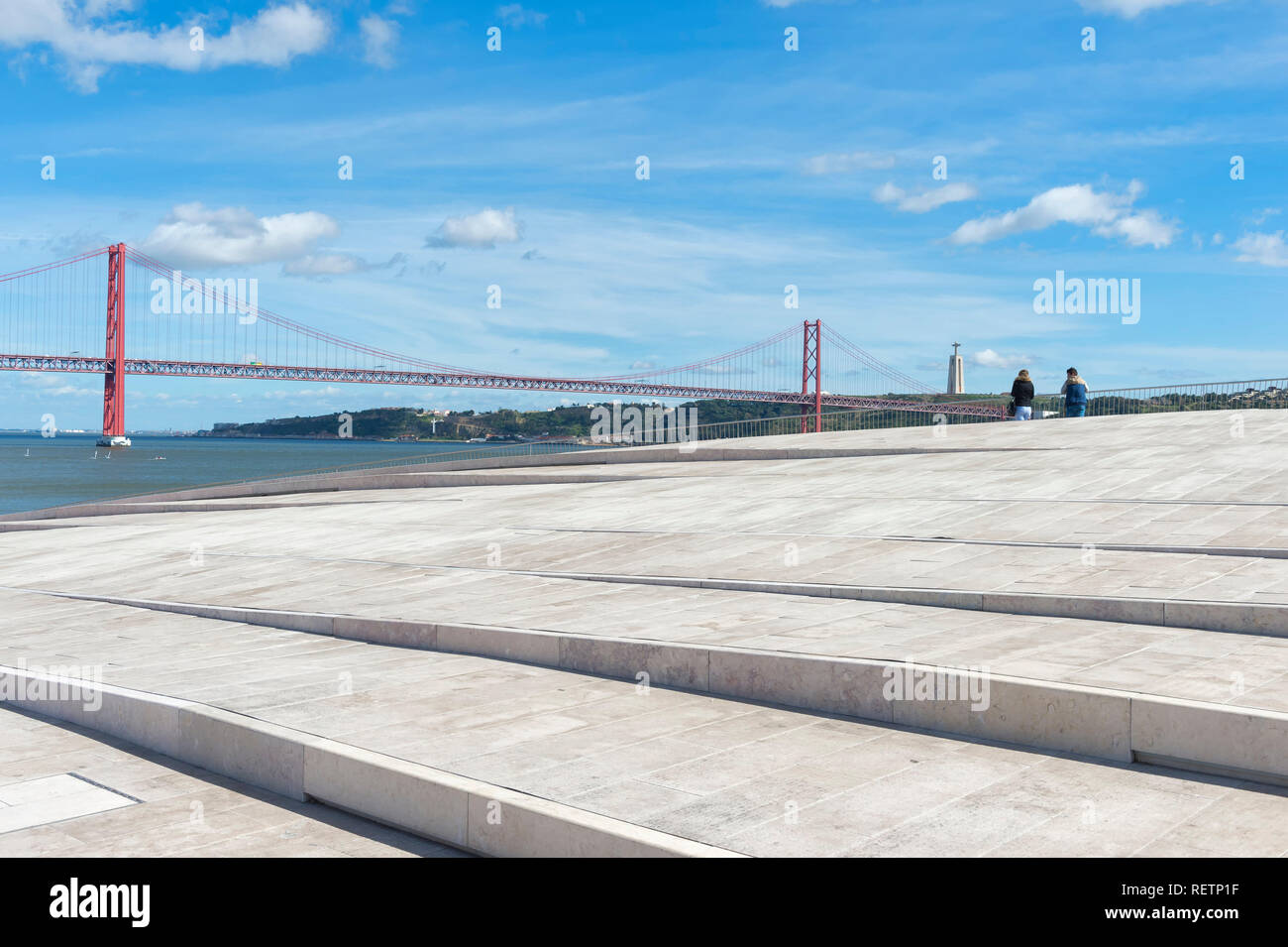 25 April Bridge, former Salazar bridge, over Tagus river viewed from the top of the MAAT, Museum of Art Architecture and Technology, Lisbon, Portugal Stock Photo