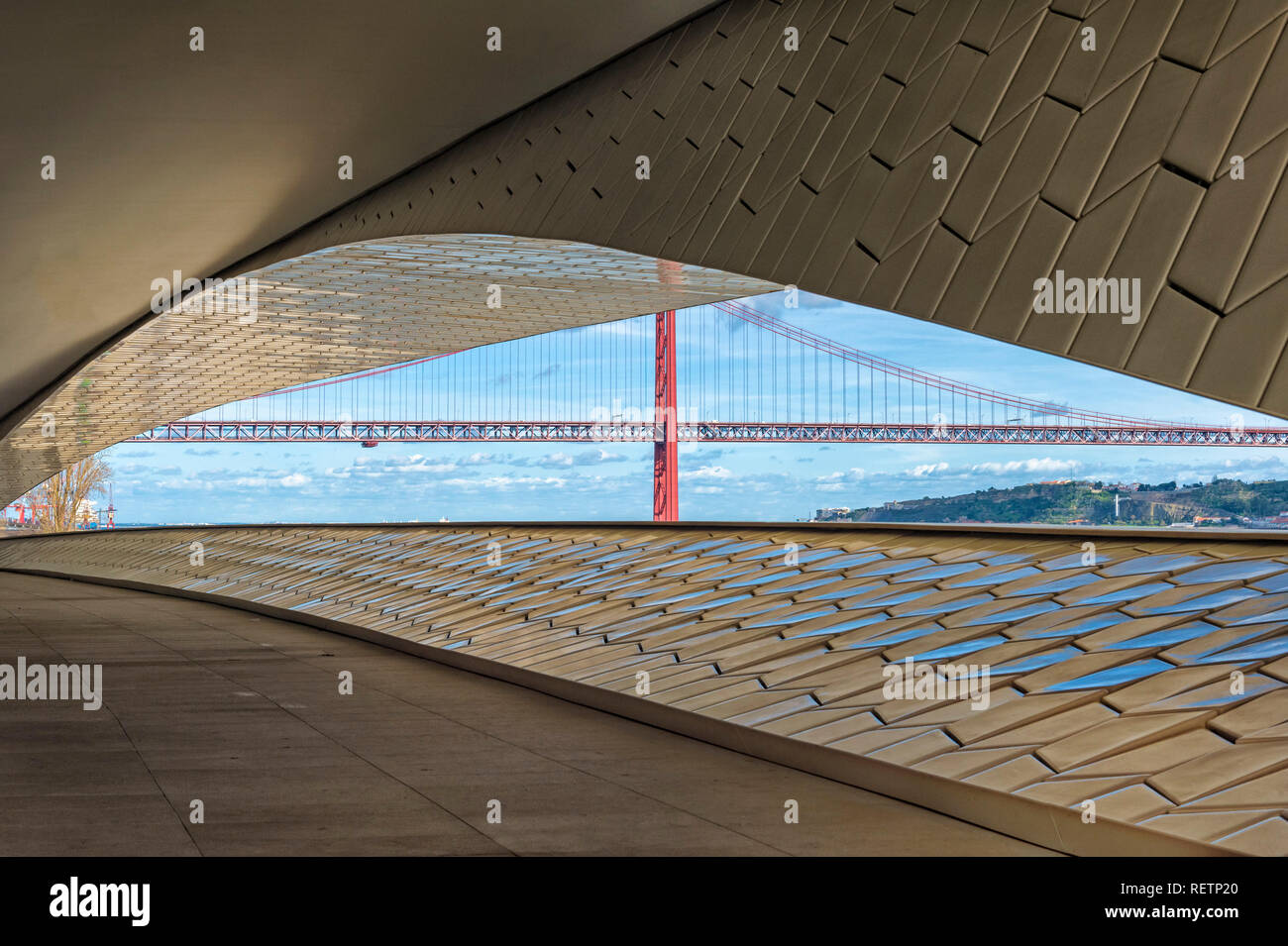 25 April Bridge, former Salazar bridge, over the Tagus river viewed from the MAAT, Museum of Art Architecture and Technology, Lisbon, Portugal Stock Photo