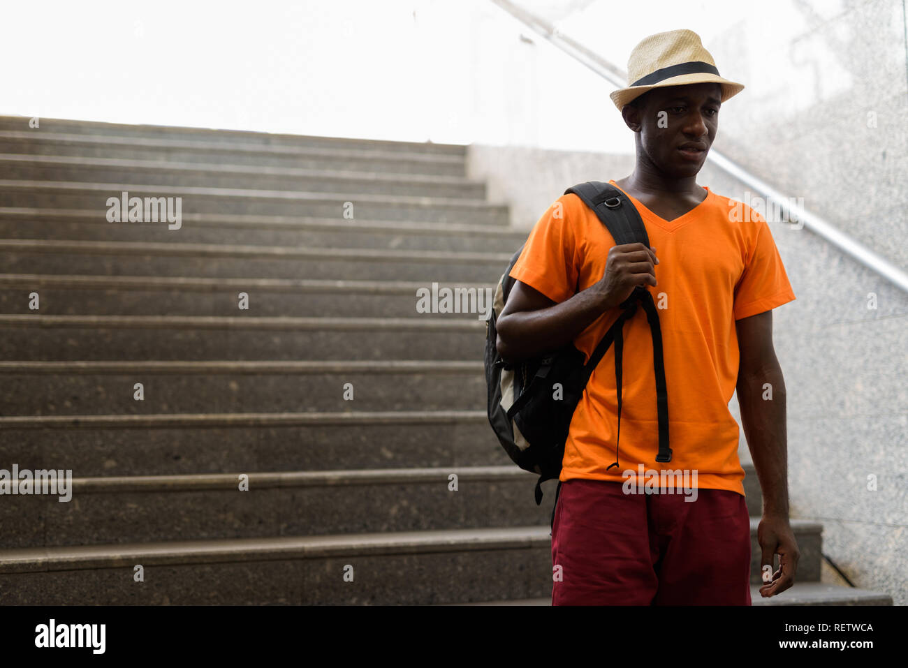Young tourist on stairs hi res stock photography and images Alamy