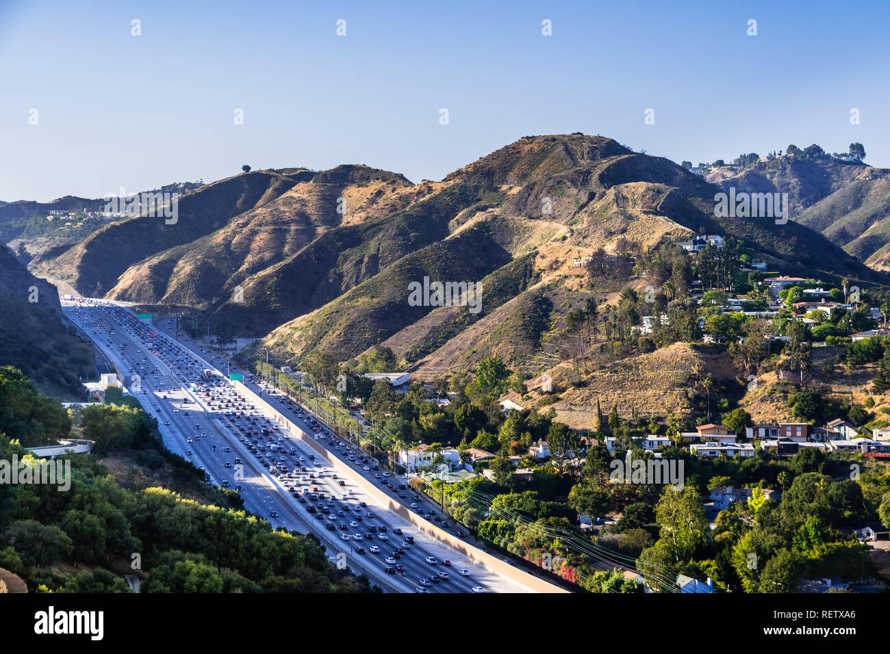Aerial view of highway 405 with heavy traffic; the hills of Bel Air neighborhood in the background; Los Angeles, California Stock Photo