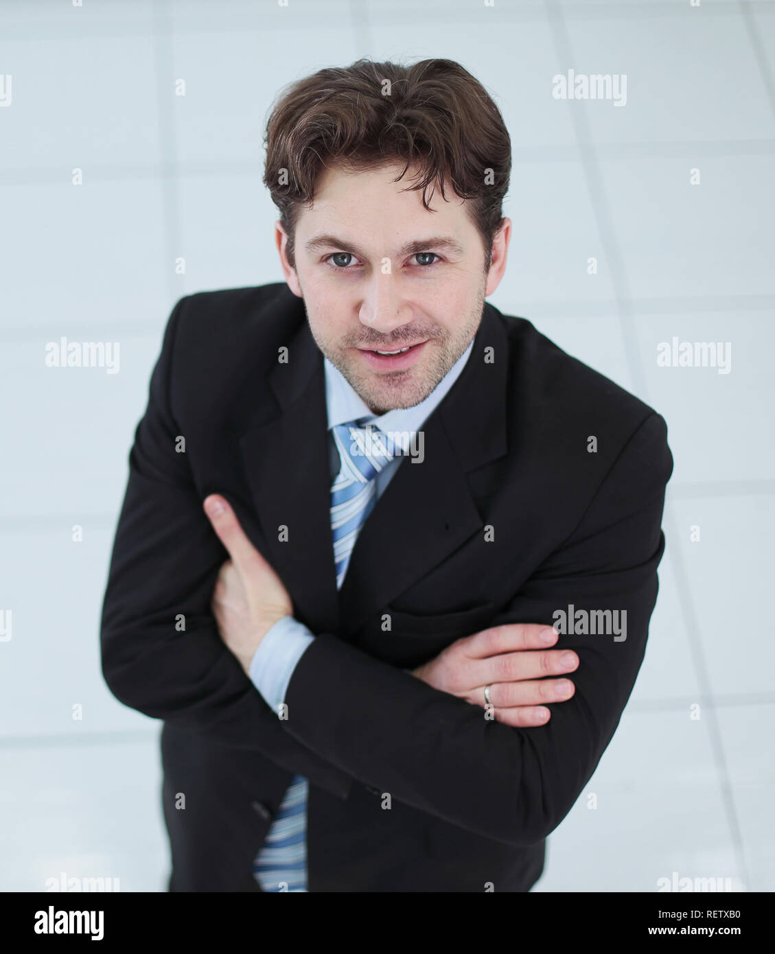 Portrait of happy smiling young businessman Stock Photo - Alamy