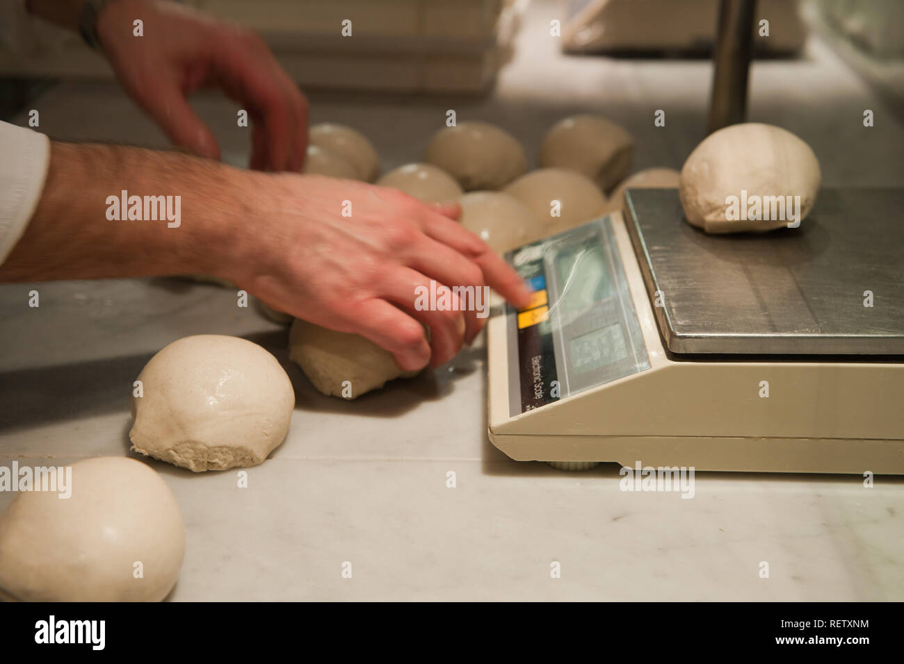 A chef make pasta for the pizza in a Italian kitchen Stock Photo Alamy