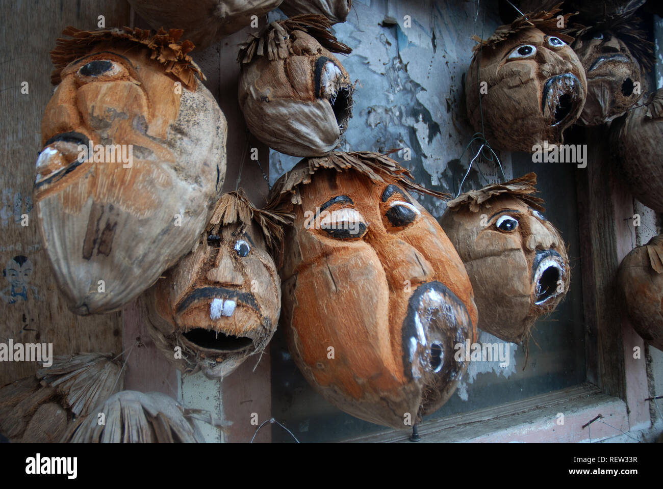 Carved coconut heads sold as souvenirs, Ubud, Bali, Indonesia Stock
