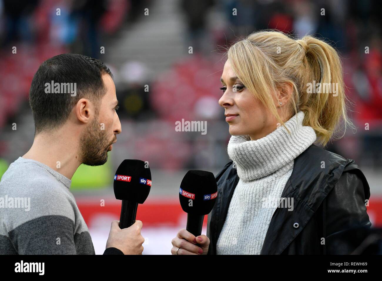 Sports presenter Sky Sport Britta Hofmann in interview with coach Domenico Tedesco FC Schalke 04, Mercedes-Benz Arena, Stuttgart Stock Photo