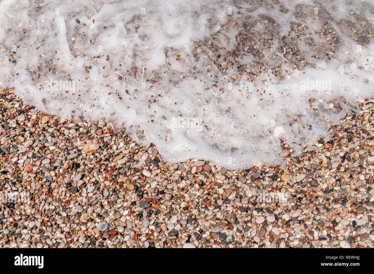 Pibble Wave Small pebble wave close beach summer sea background Stock Photo - Alamy