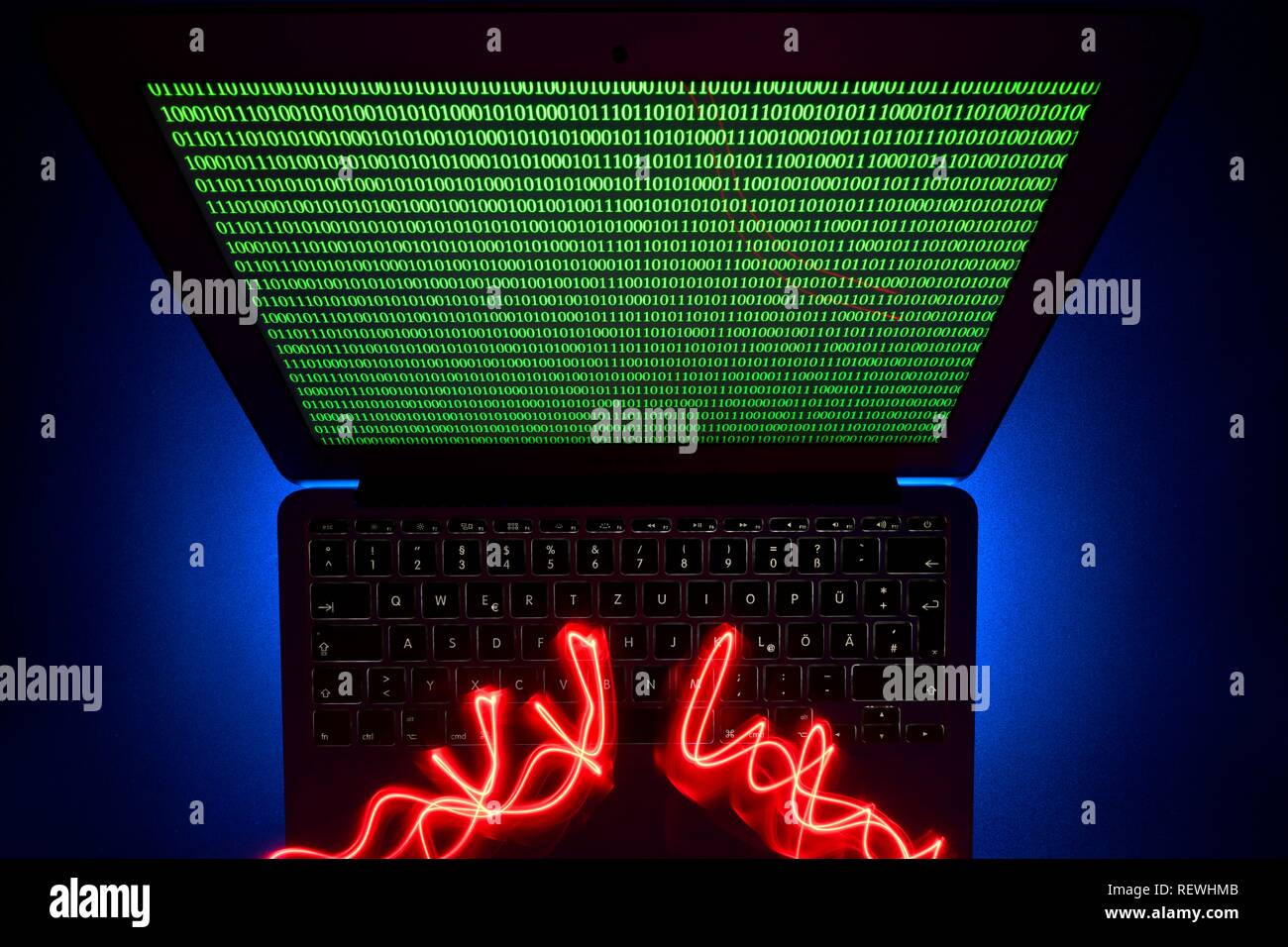 Traces of light on computer keyboard, symbol image cybercrime, computer crime, data protection, Baden-Württemberg, Germany Stock Photo