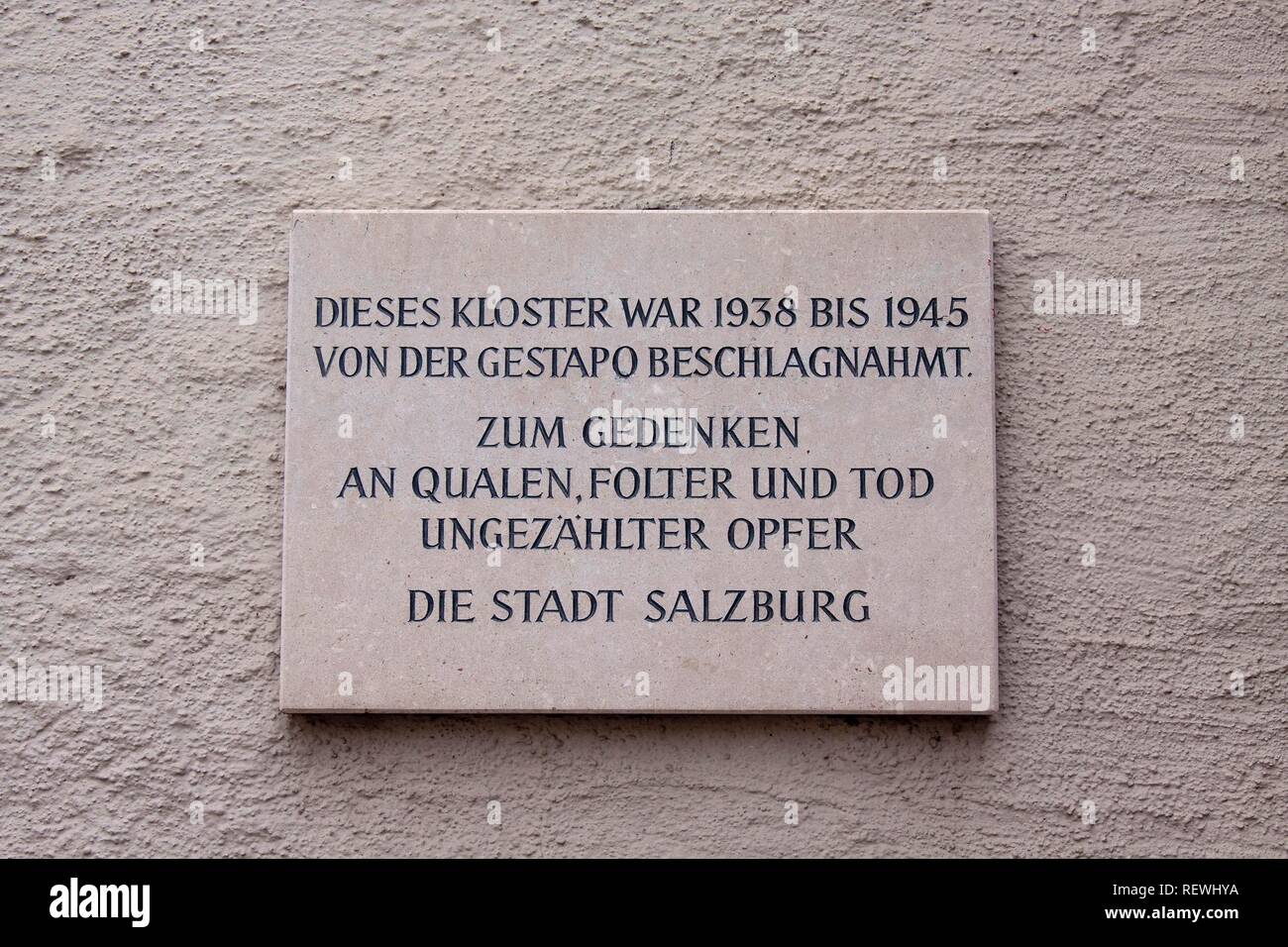 Commemorative plaque outside at the former Franciscan monastery, Franziskanergasse 5, Salzburg, Austria Stock Photo