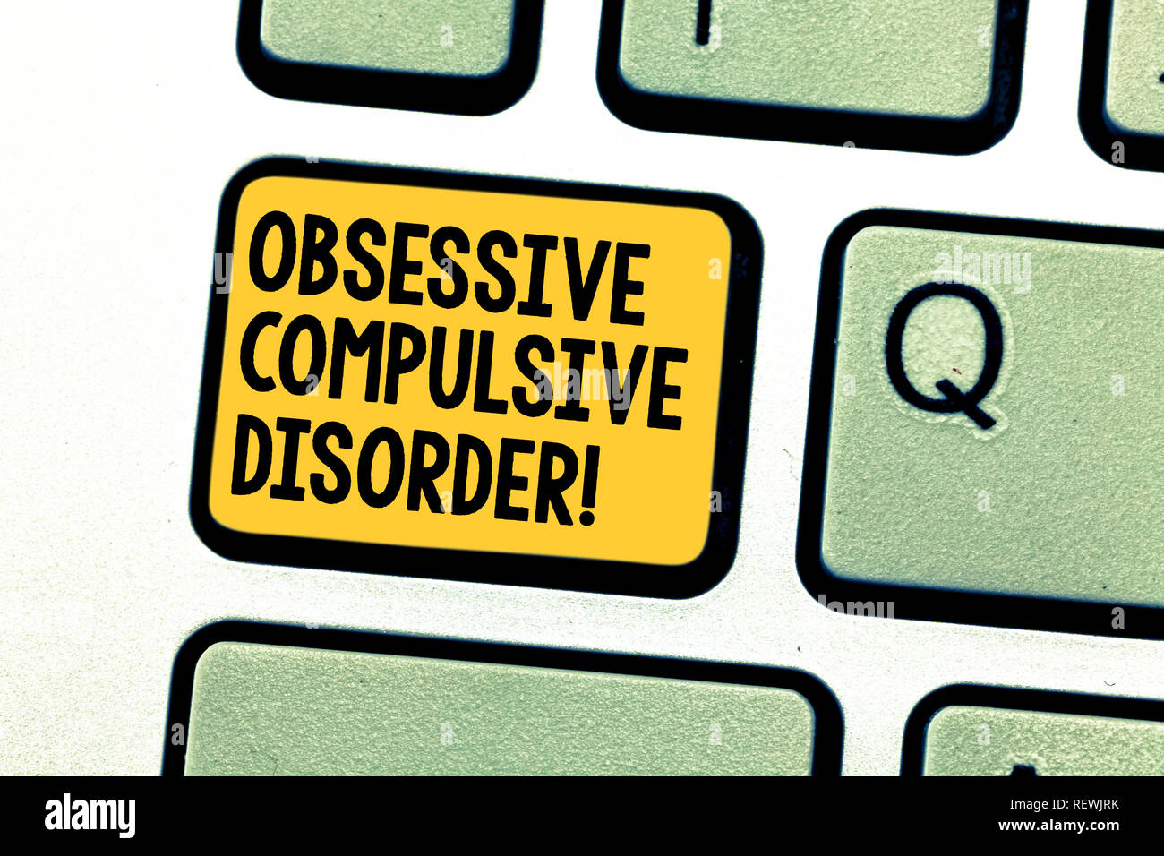 Writing note showing Obsessive Compulsive Disorder. Business photo showcasing Person has uncontrollable reoccurring thoughts Keyboard key Intention to Stock Photo