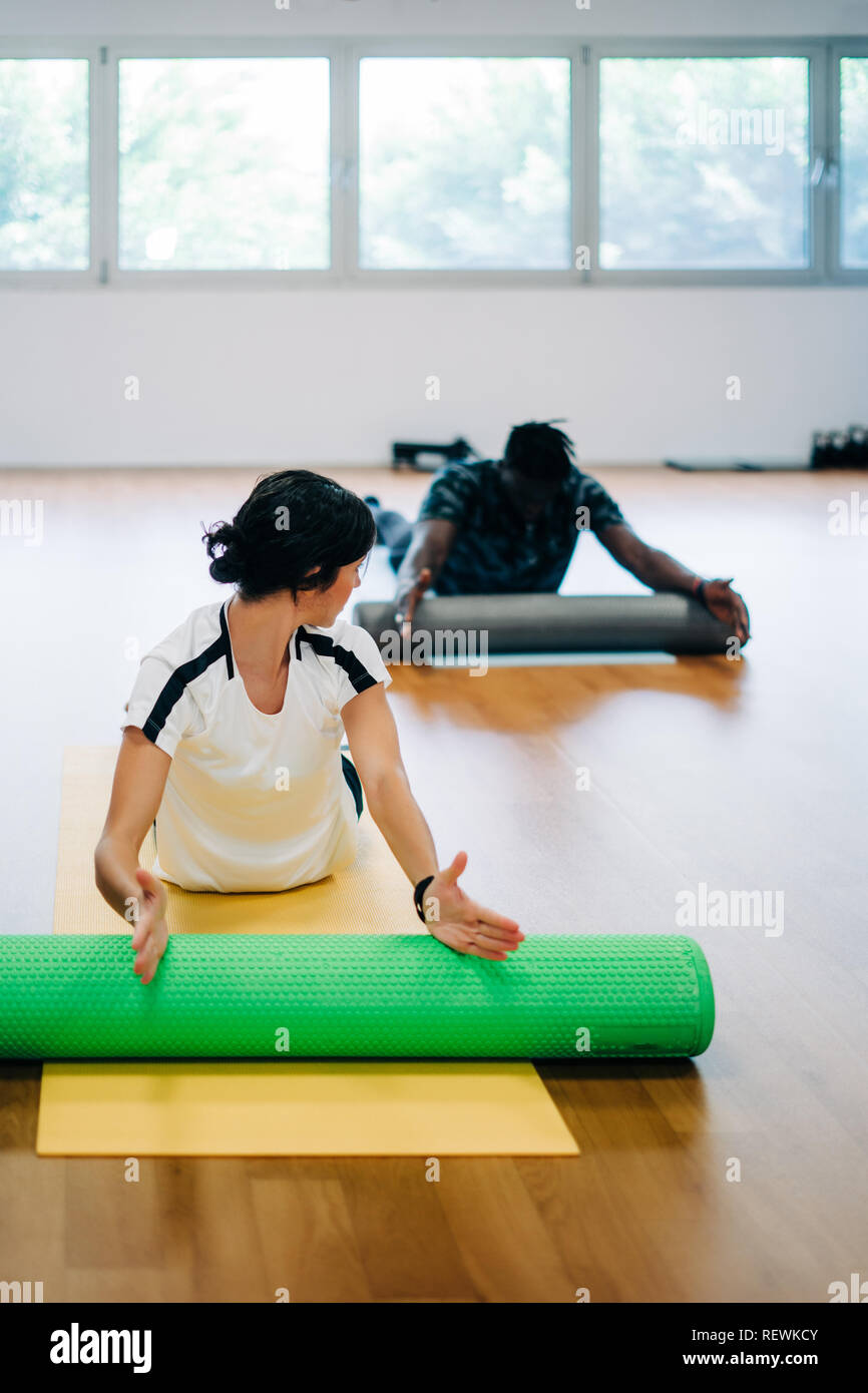Woman exercises foam roller in hi-res stock photography and images - Alamy
