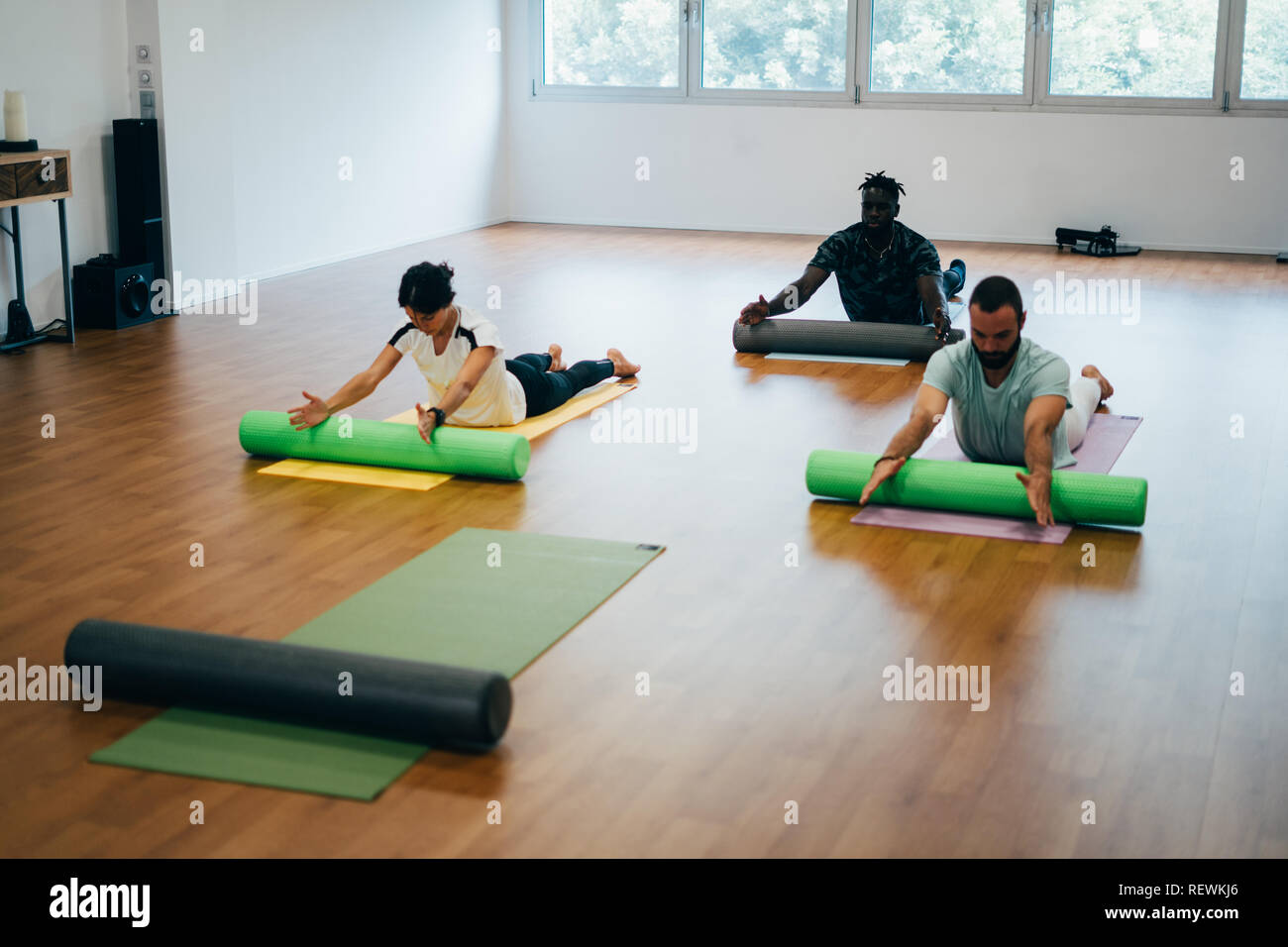 Woman exercises foam roller in hi-res stock photography and images - Alamy