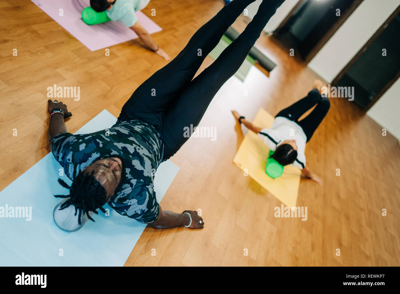 Woman exercises foam roller in hi-res stock photography and images - Alamy