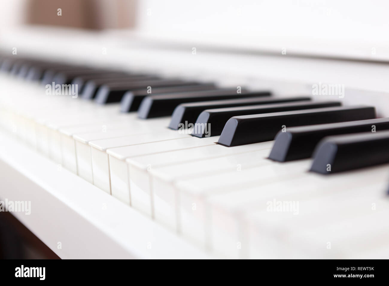 Close up of black and white piano keys. Shallow deep of field. Stock Photo