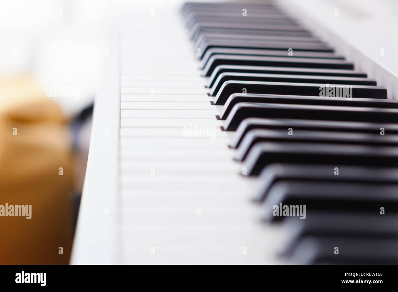 Close up of black and white piano keys. Shallow deep of field. Stock Photo