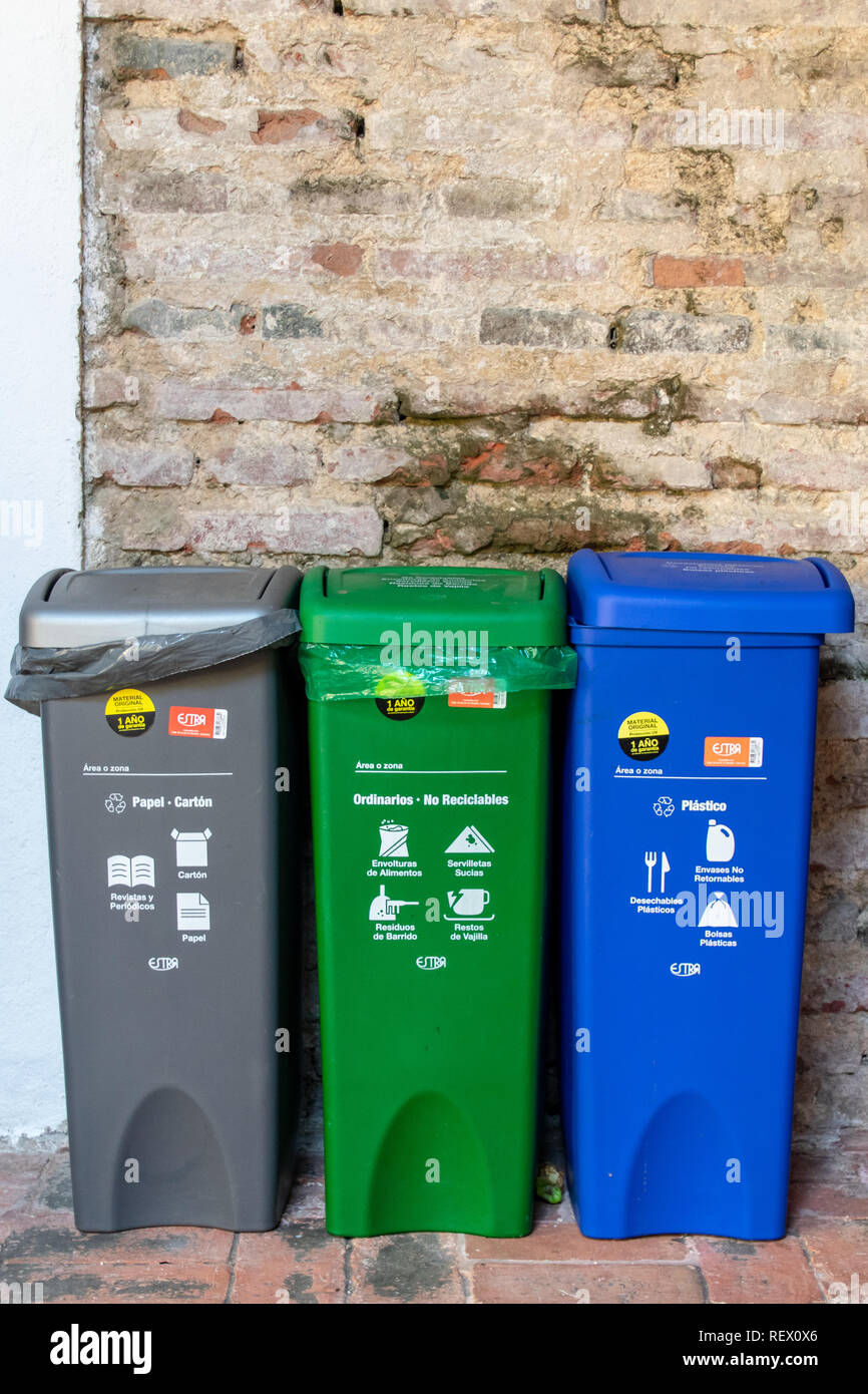 Recycling bins in the wall Stock Photo Alamy
