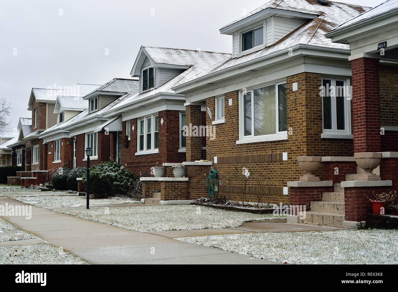 Chicago, Illinois, USA. A block of bungalow-styled homes typical and found thoroughout city neighborhoods. Stock Photo
