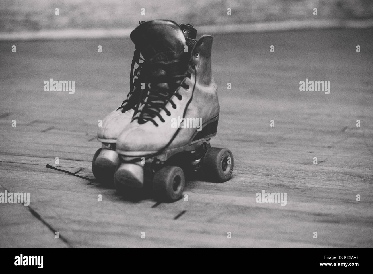 rollerskates at a roller rink in black and white Stock Photo