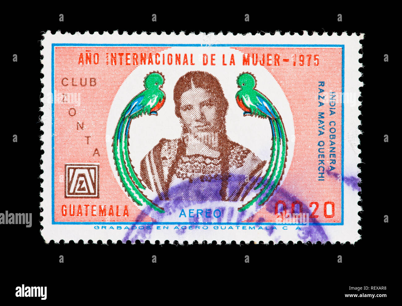 Postage stamp from Guatemala depicting two quetzals and Maya Quekchi woman wearing Huipil, issued for International Women's Year, 1975. Stock Photo