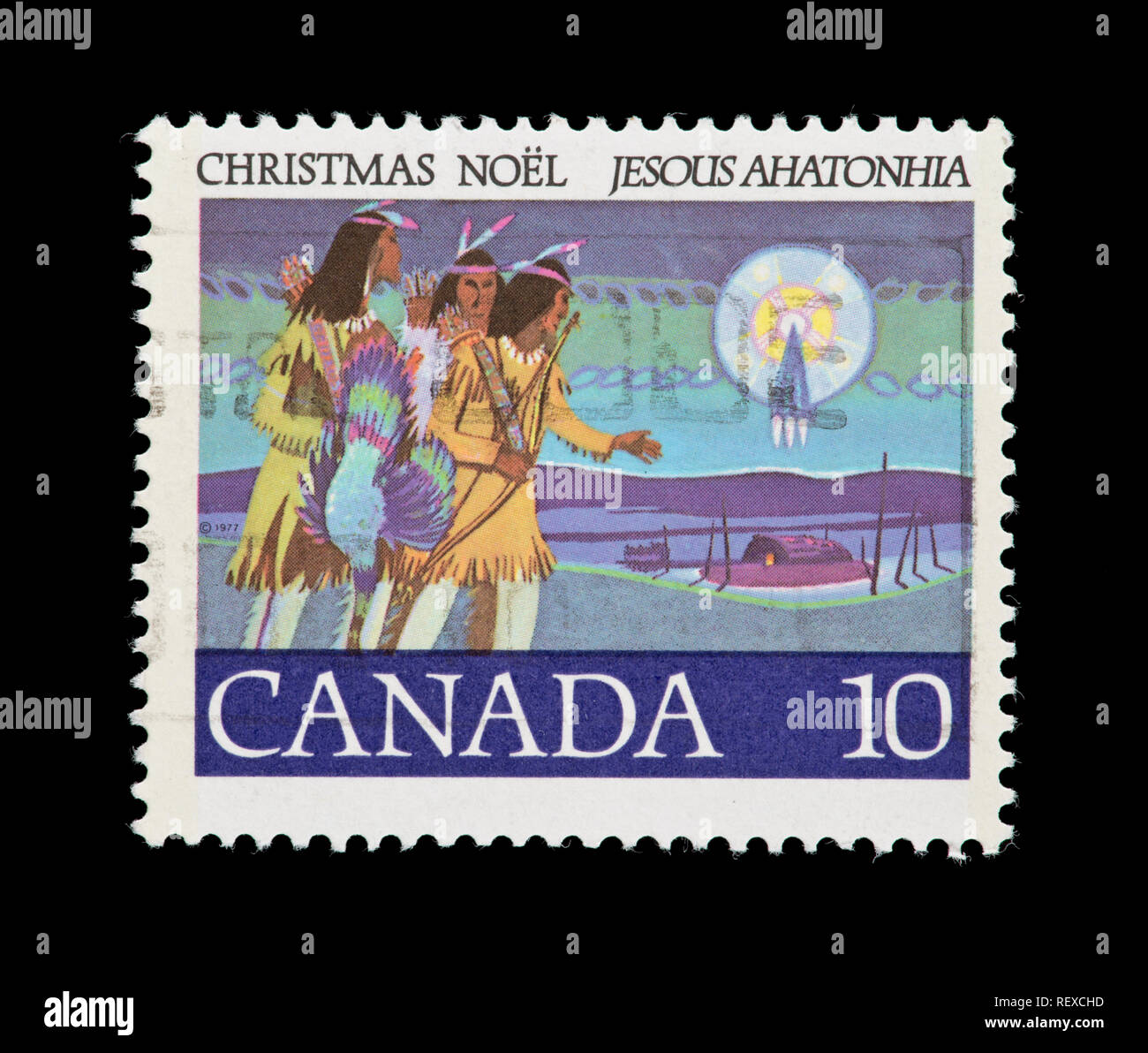 Postage stamp from Canada depicting hunters following a star. Stock Photo