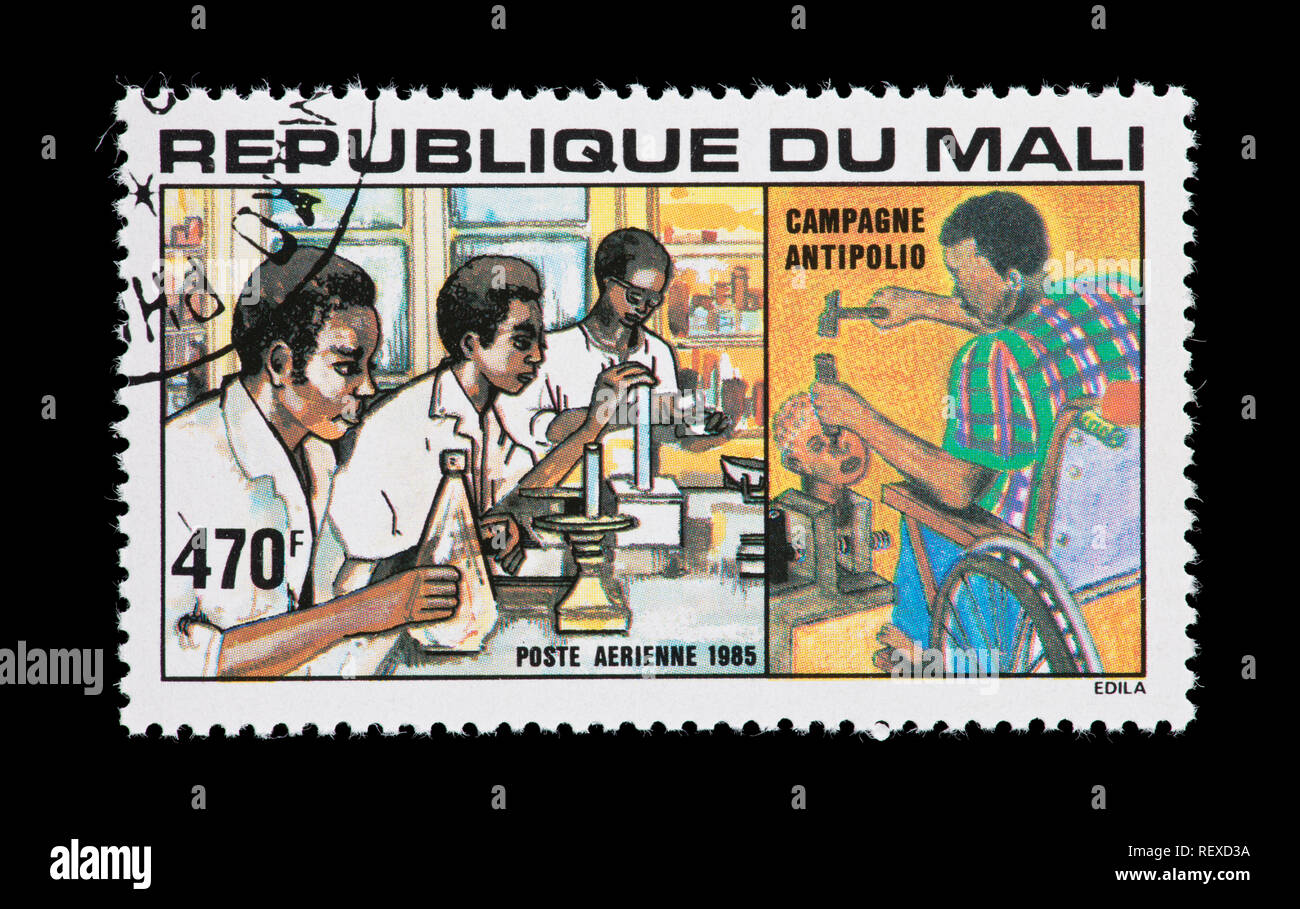 postage stamp from Mali depicting an anti-polio campaign, research facility and paralyzed polio victim. Stock Photo