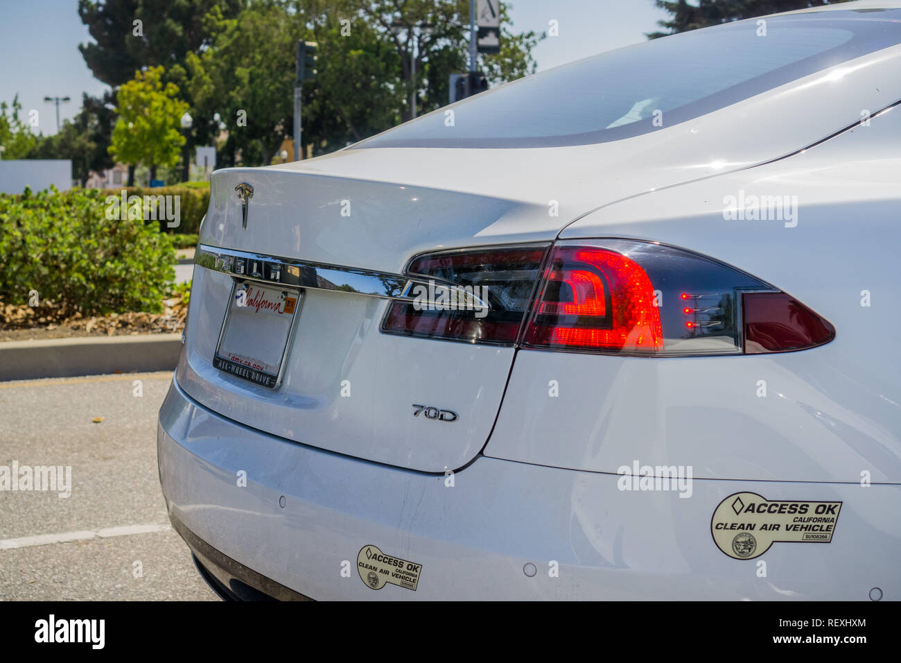 August 30, 2017 Sunnyvale/CA/USA - Tesla Model S 70D rear light detail. Carpool lane Access OK clean air vehicle California decal Stock Photo