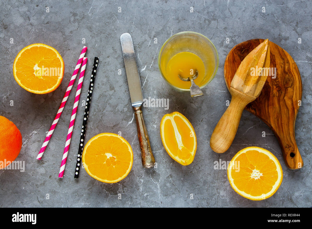 Making fresh orange juice. Flat-lay of fruits for making squized juice. Healthy lifestyle and summer beverages Stock Photo