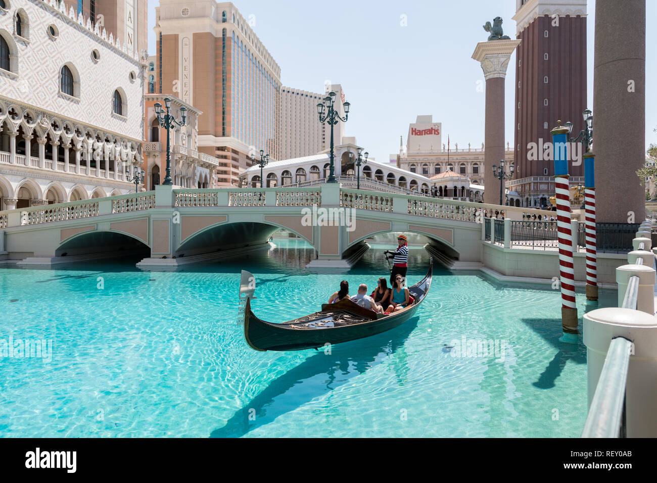 Las Vegas, Nevada, USA - September 1, 2017: Tourists enjoying ride in gondola at Grand Canal by the bridge at The Venetian Resort Hotel and Casino.  T Stock Photo