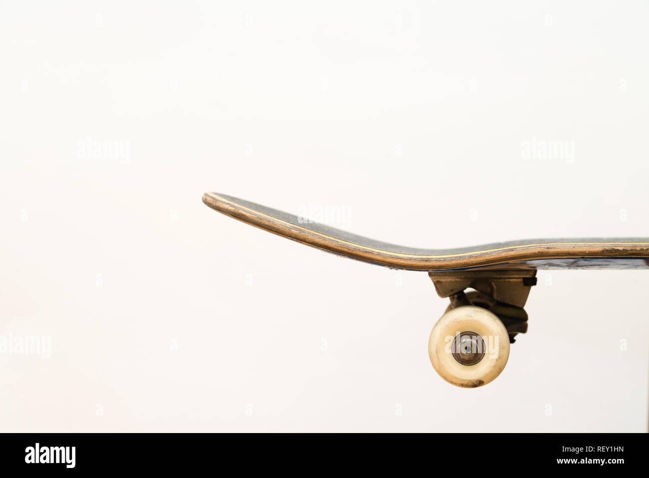 Professional skateboard on white background side view, deck, complete