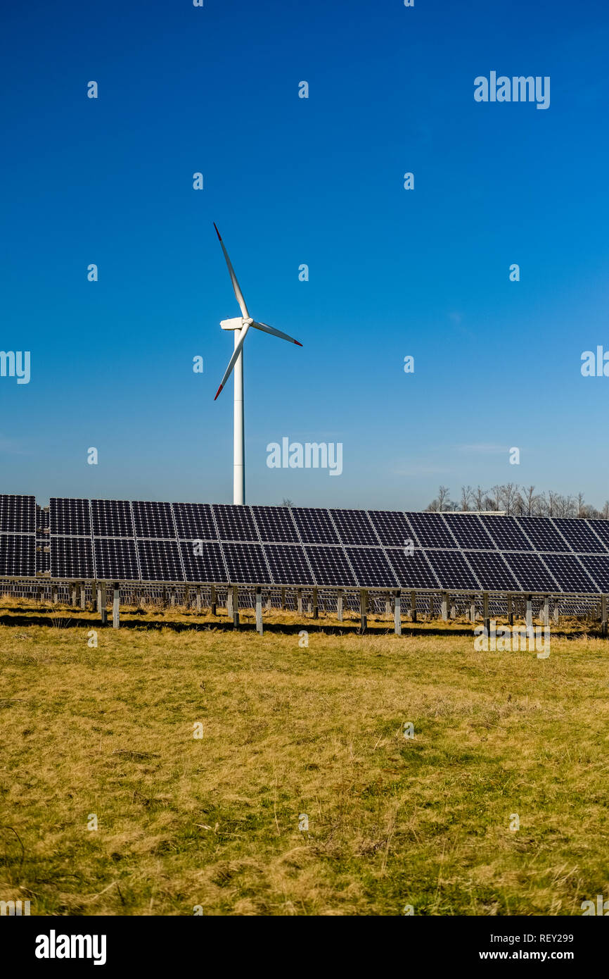 Photovoltaik solar panels and a wind power plant in agriculture