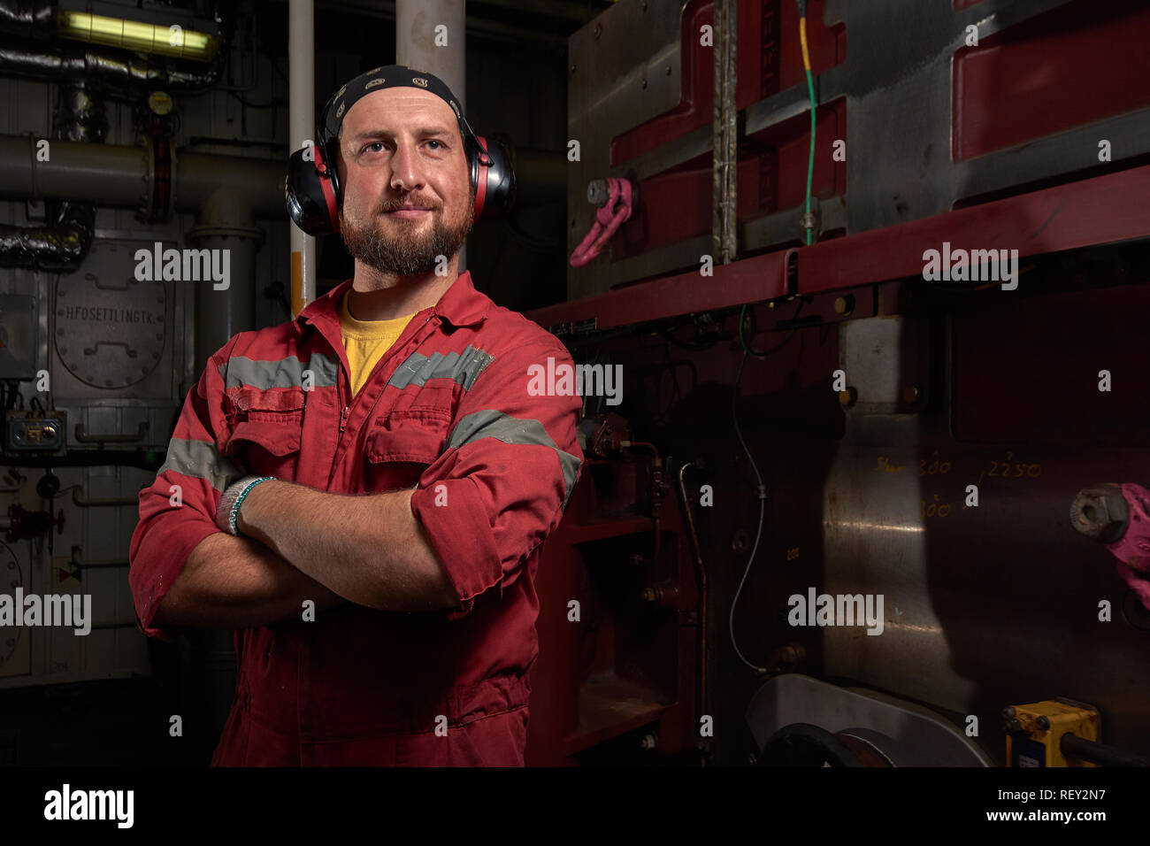 Mechanic ship main engine on dark background. Industrial marine engine