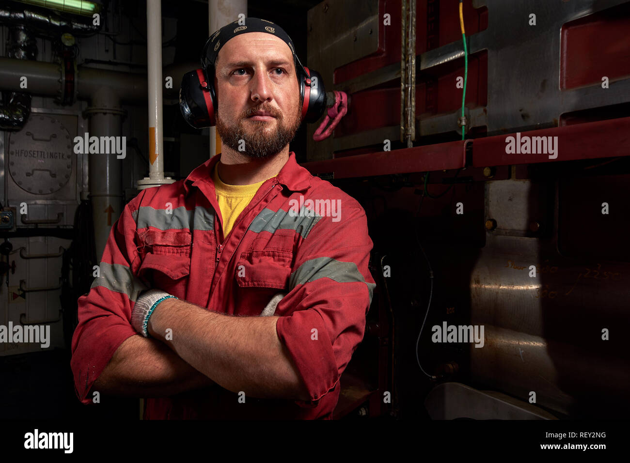 Mechanic ship main engine on dark background. Industrial marine engine