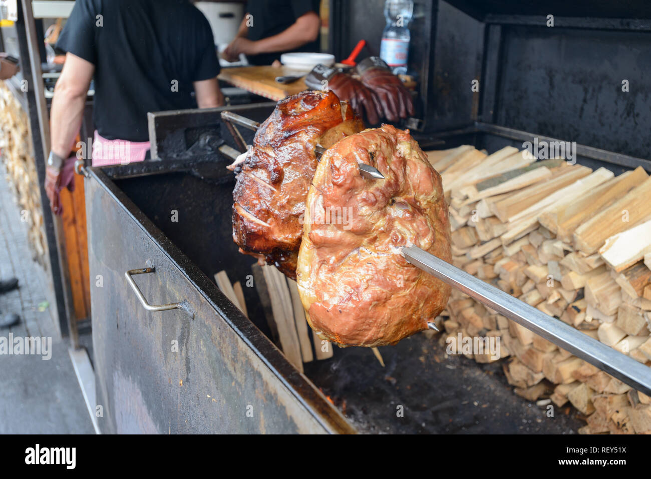 Prague Ham is traditionally served in restaurants and from street vendors with a side of boiled potatoes  and often accompanied by Czech beer. Stock Photo